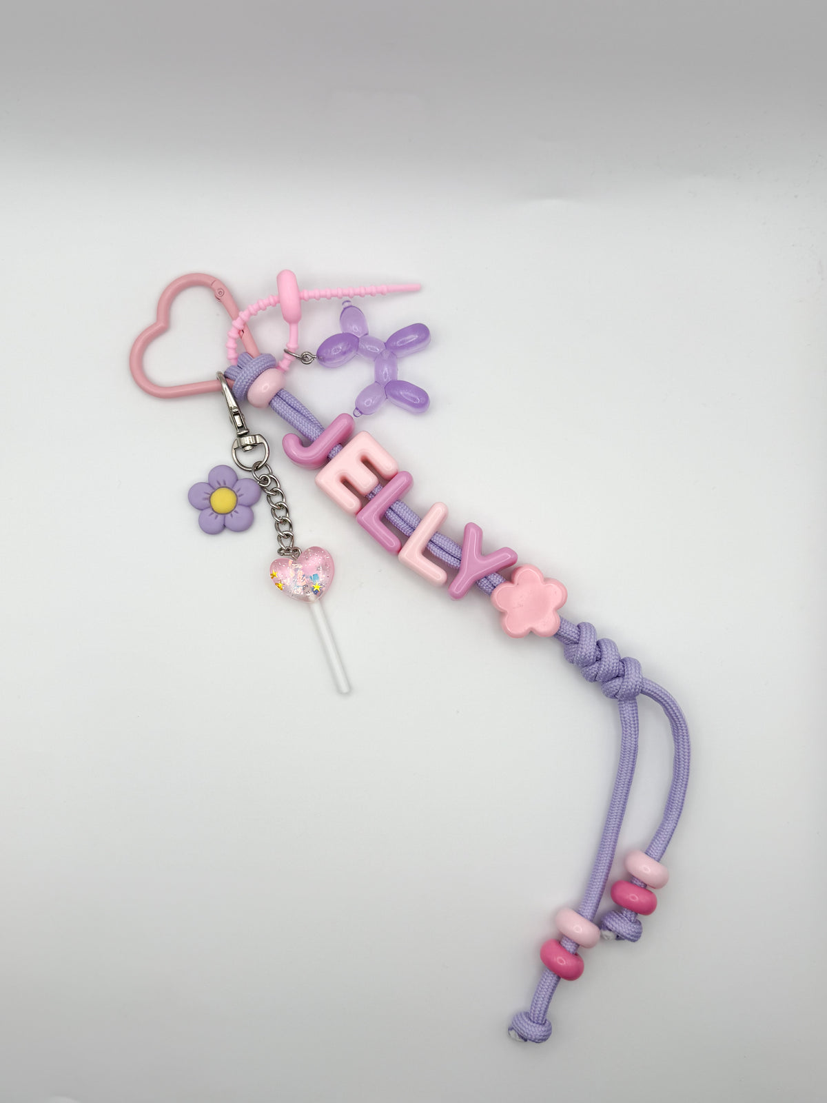 Personalized name (purple paracord/ pink lollipop)